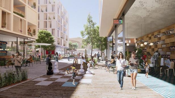 Eine belebte Fußgängerzone mit Geschäften, Restaurants und Menschen, die sich aufhalten.