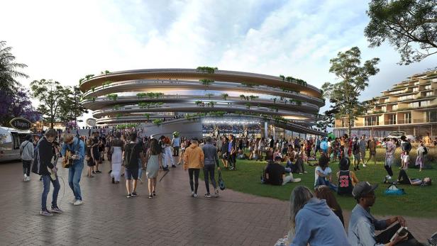 Eine Menschenmenge versammelt sich vor einer modernen Arena in San Diego.