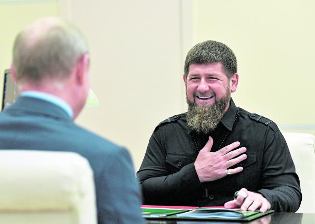FILE PHOTO: Head of the Chechen Republic Kadyrov meets with Russia's President Putin near Moscow