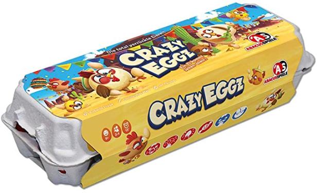 Ein Karton des Spiels „Crazy Eggz“ von Abacusspiele mit lustigen Hühner-Illustrationen.