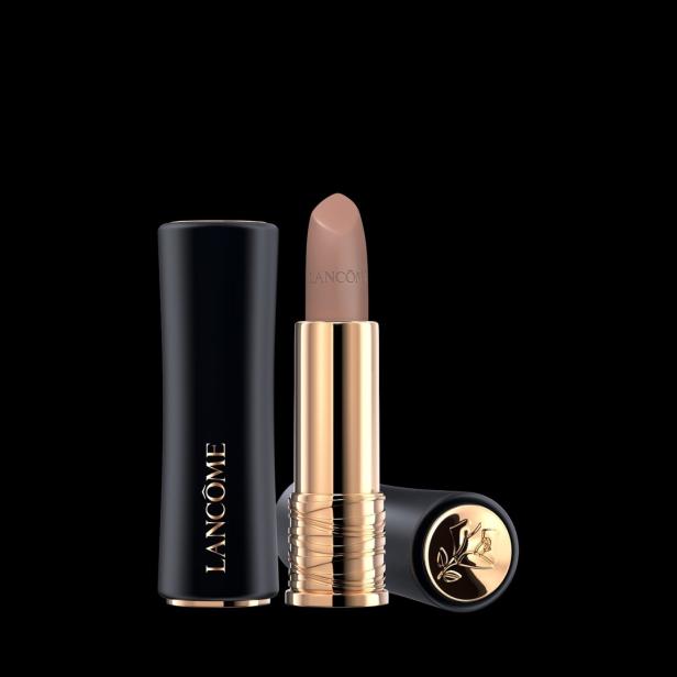 Ein geöffneter Lancôme Lippenstift in einer goldenen Hülse mit schwarzer Kappe.