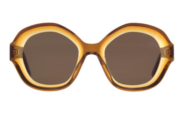 Eine braune, übergroße Sonnenbrille mit runden Gläsern.
