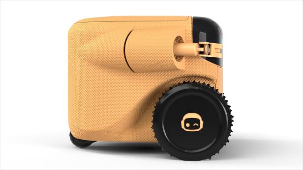Ein würfelförmiger, beiger Roboter mit großen, schwarzen Rädern steht auf einem weißen Untergrund.