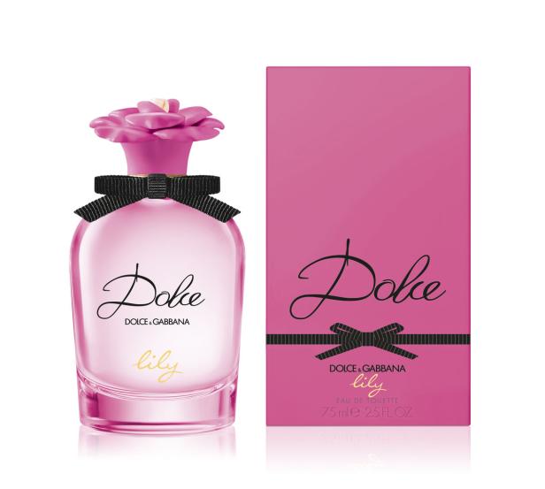 Eine Flasche „Dolce & Gabbana Lily“ Eau de Toilette neben der passenden rosa Verpackung.