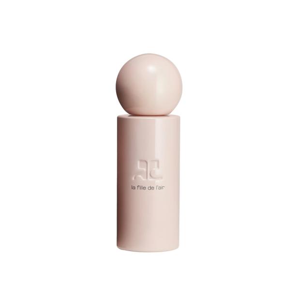 Ein Flakon des Parfüms „La Fille de l'air“ von Courrèges in blassem Rosa.