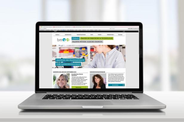 Ein Laptop zeigt die Webseite von Femtech mit dem Fokus auf Frauen in Forschung und Technologie.