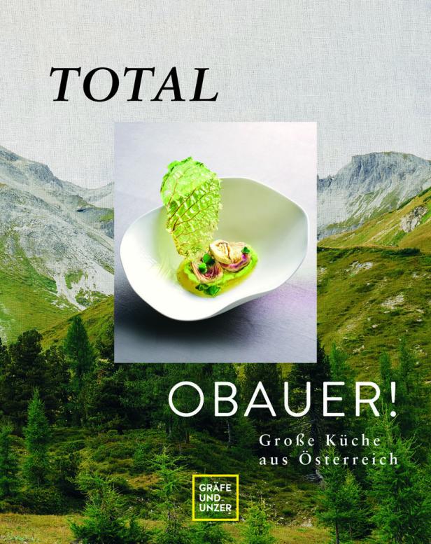 Das Cover des Kochbuchs „Obauer! Große Küche aus Österreich“ mit einem Gericht vor einer Berglandschaft.