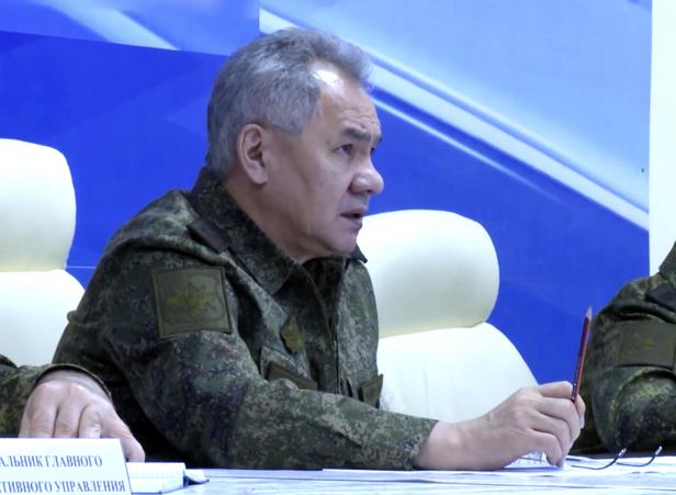 Russian Defence Minister Sergei Shoigu inspecting troops