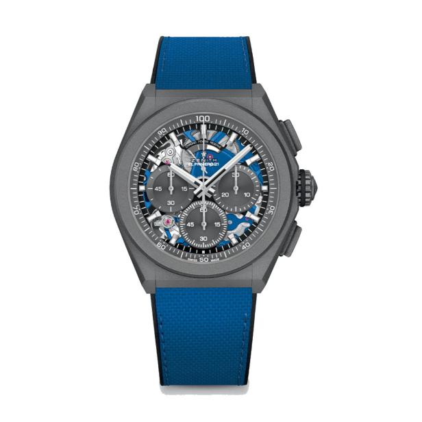 Eine graue Zenith El Primero 21 Uhr mit blauem Armband.