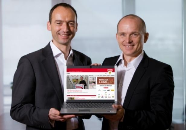 Land Rover Austria - Hutchison 3G Austria/Mobile Advertising-Format Zwei Männer im Anzug präsentieren einen Laptop mit der Webseite des DVV.