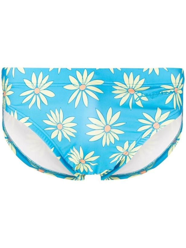 Eine blaue Badehose mit Gänseblümchenmuster.
