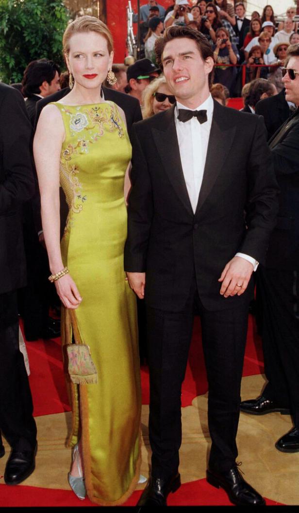 Nicole Kidman und Tom Cruise posieren auf einem roten Teppich.