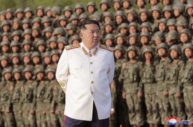 North Korean Supreme Leader Kim Jong-Un meets with solders after military parade