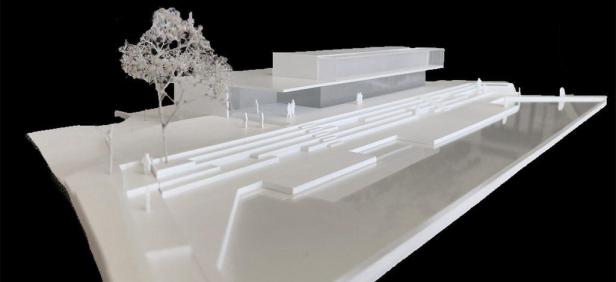 Ein Architekturmodell eines modernen Waldcafés mit stilisierten Bäumen und Personen.