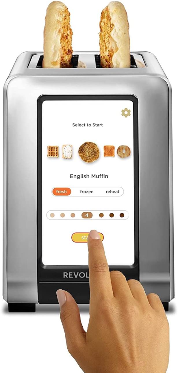 Ein Toaster mit Touchscreen, der gerade zwei getoastete Brötchen zubereitet.