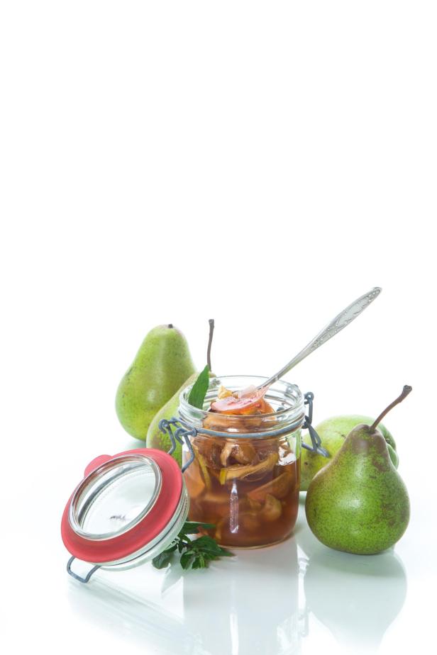 sweet fruit jam with apples and pears in a glass jar