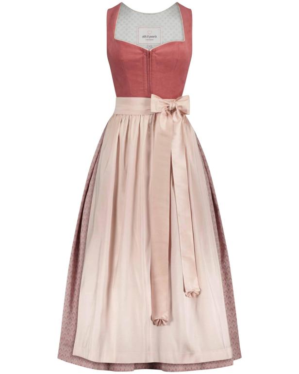 Ein rosafarbenes Dirndl mit Schleife und hellen Akzenten.