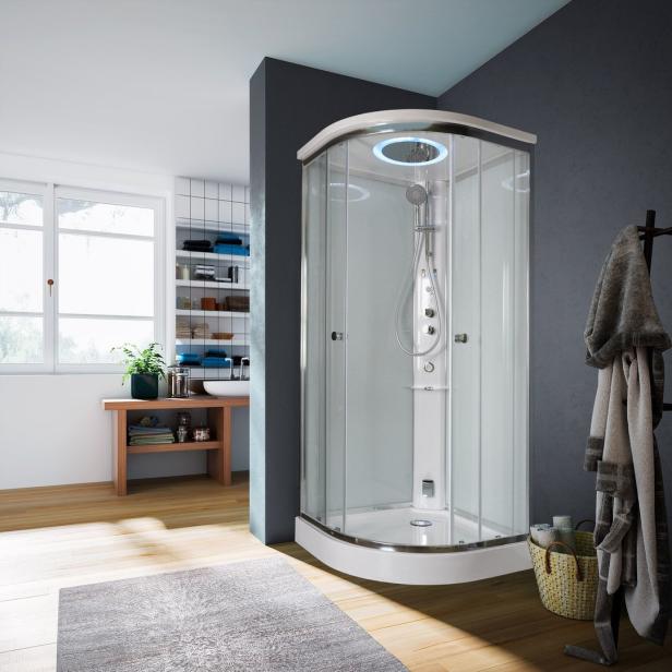 Ein modernes Badezimmer mit einer Duschkabine mit eingebauter Beleuchtung.