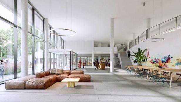 Die Lobby eines modernen Gebäudes mit Sitzgelegenheiten und einem langen Tisch mit Stühlen.