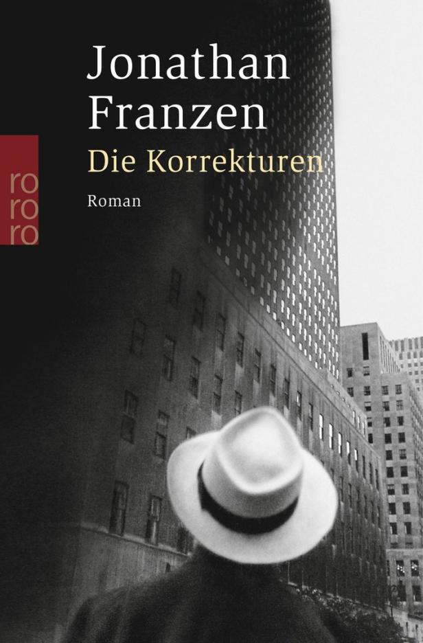 Das Buchcover von Jonathan Franzens „Die Korrekturen“ zeigt eine Person mit Hut vor Hochhäusern.