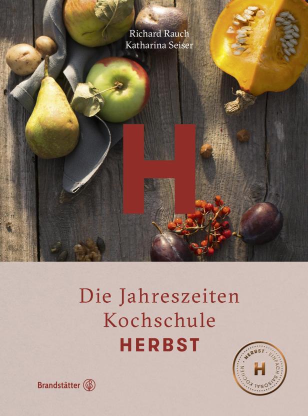 Das Cover des Buches „Die Jahreszeiten Kochschule: Herbst“ mit saisonalem Obst und Gemüse.