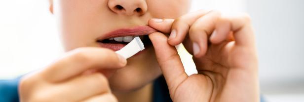 Woman Chewing Wet Moist Nicotine Product