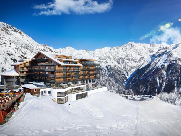 Das Hotel „Schöne Aussicht“ liegt in einer verschneiten Berglandschaft.