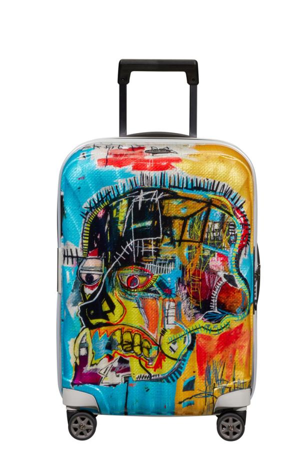 Ein Koffer mit einem farbenfrohen, abstrakten Design im Stil von Basquiat.
