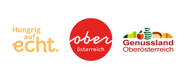 Logos von „Hungrig auf echt.“, „Oberösterreich“ und „Genussland Oberösterreich“ nebeneinander.