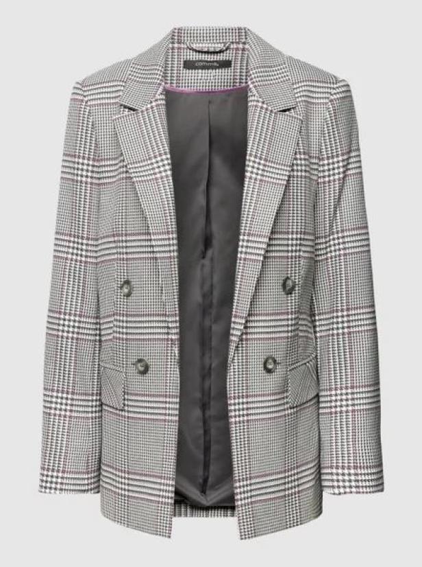 Ein zweireihiger Blazer mit Hahnentrittmuster in Grau, Weiß und Rot.