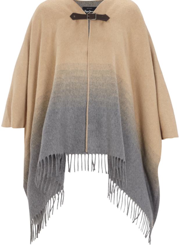 Ein beigefarbener und grauer Poncho mit Fransen und einem braunen Riemen am Kragen.