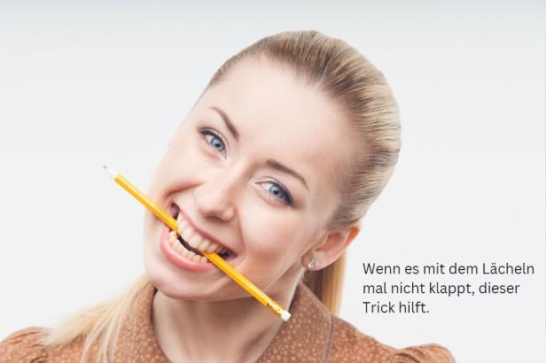 Lächeln mit einem Bleistift