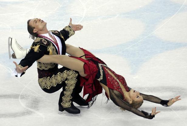 FILE PHOTO: Tatiana Navka and Roman Kostomarov perform their free dance at the 2006 Turin Winter Olympics