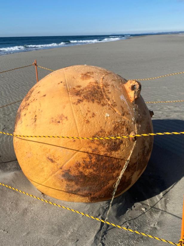 A ball is seen on a beach in Hamamatsu