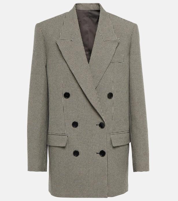 Ein zweireihiger Blazer mit Hahnentrittmuster vor einem weißen Hintergrund.