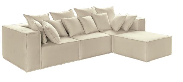Ein modulares Ecksofa in Beige mit vielen Kissen.