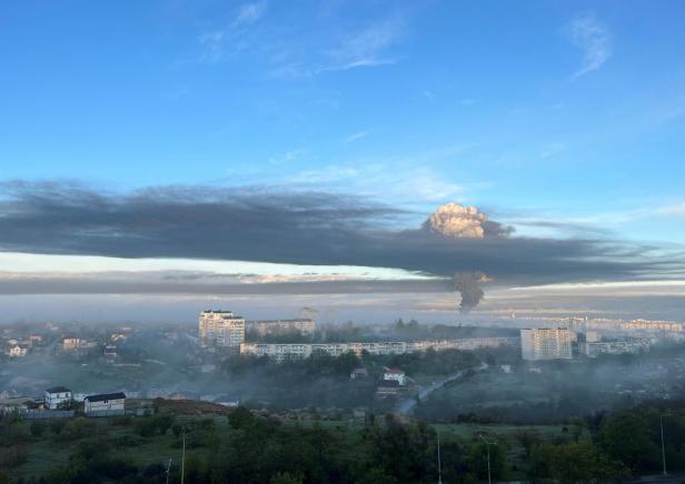 Smoke rises following an alleged drone attack in Sevastopol