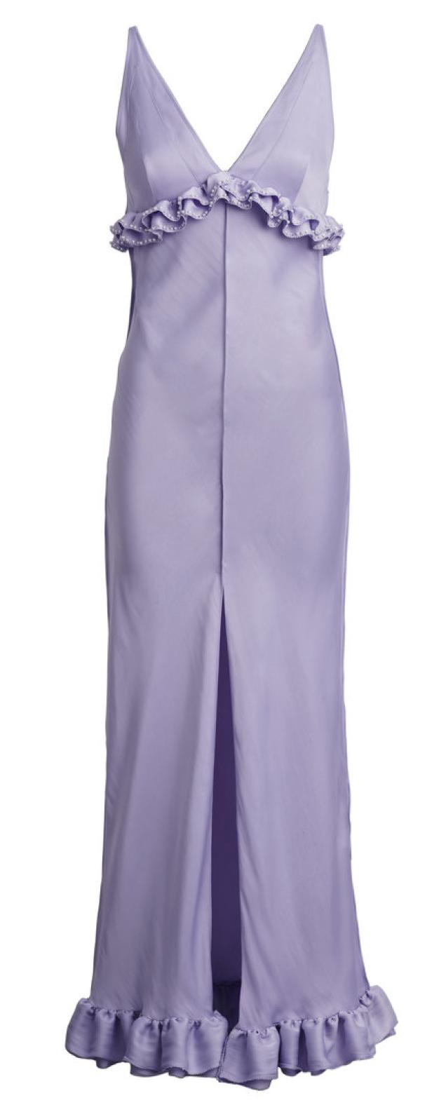Ein lila, ärmelloses Kleid mit Rüschen und einem Schlitz in der Mitte.