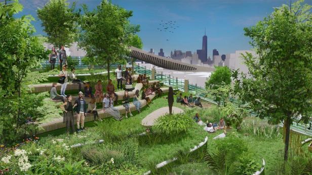 Eine Gruppe von Menschen versammelt sich auf einer begrünten Dachterrasse mit Blick auf die Skyline der Stadt.