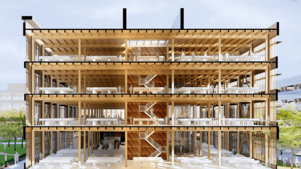 Ein Querschnitt eines vierstöckigen Bürogebäudes mit Holzrahmen und großen Fenstern.