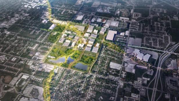 Eine Luftaufnahme eines städtischen Gebiets mit mehreren Walmart-Filialen.