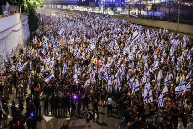 Anti-government protesters block Ayalon highway in Tel Aviv