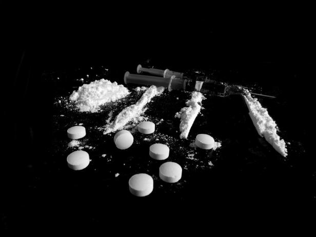 Pills, cocaine drug powder lines and injections