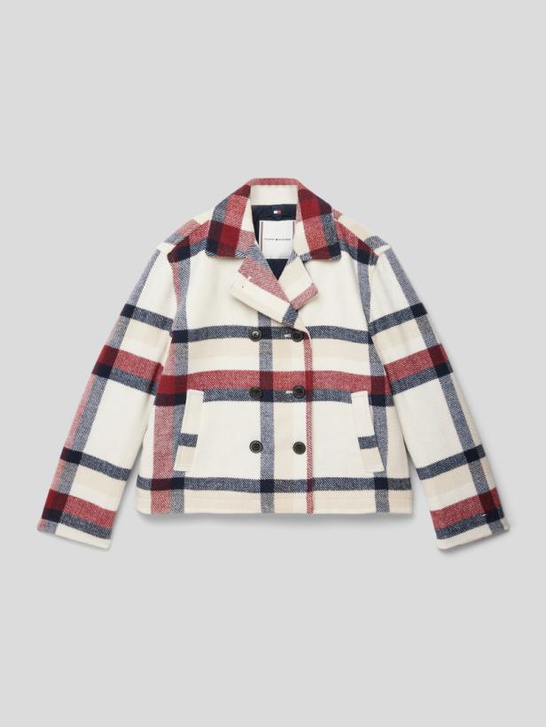 Eine karierte Cabanjacke von Tommy Hilfiger in Creme, Rot und Marineblau.
