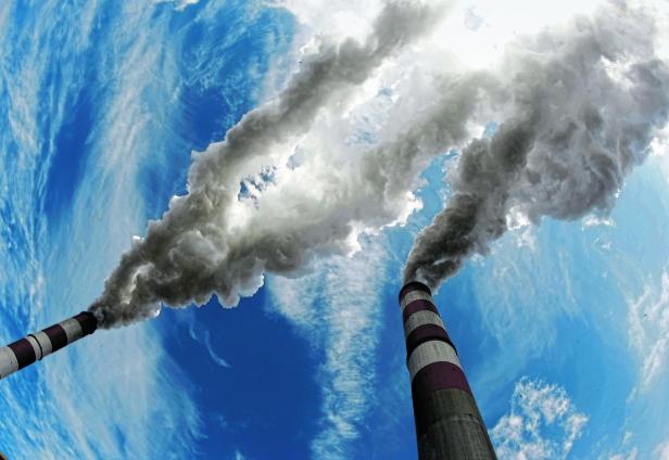 FILE PHOTO: Smoke billows from the chimneys of Belchatow Power Station in Poland