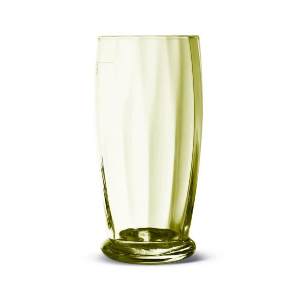 Ein leeres, schlankes Glas mit einem dicken Boden steht auf einem weißen Untergrund.