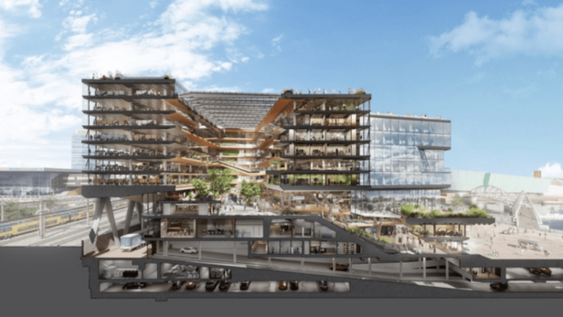 Ein Querschnitt des Booking.com Campus, der Büros, Grünflächen und eine Tiefgarage zeigt.