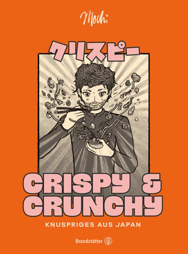 Ein Mann isst mit Stäbchen knusprige japanische Snacks von Mochi.