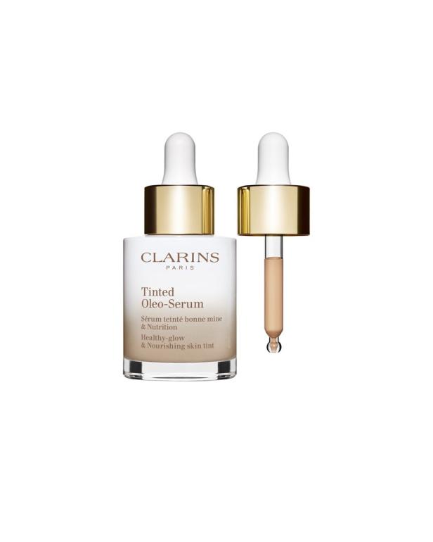 Eine Flasche Clarins „Tinted Oleo-Serum“ mit einem Applikator.