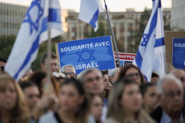 People rally in Geneva in solidarity with Israel after Hamas attacks